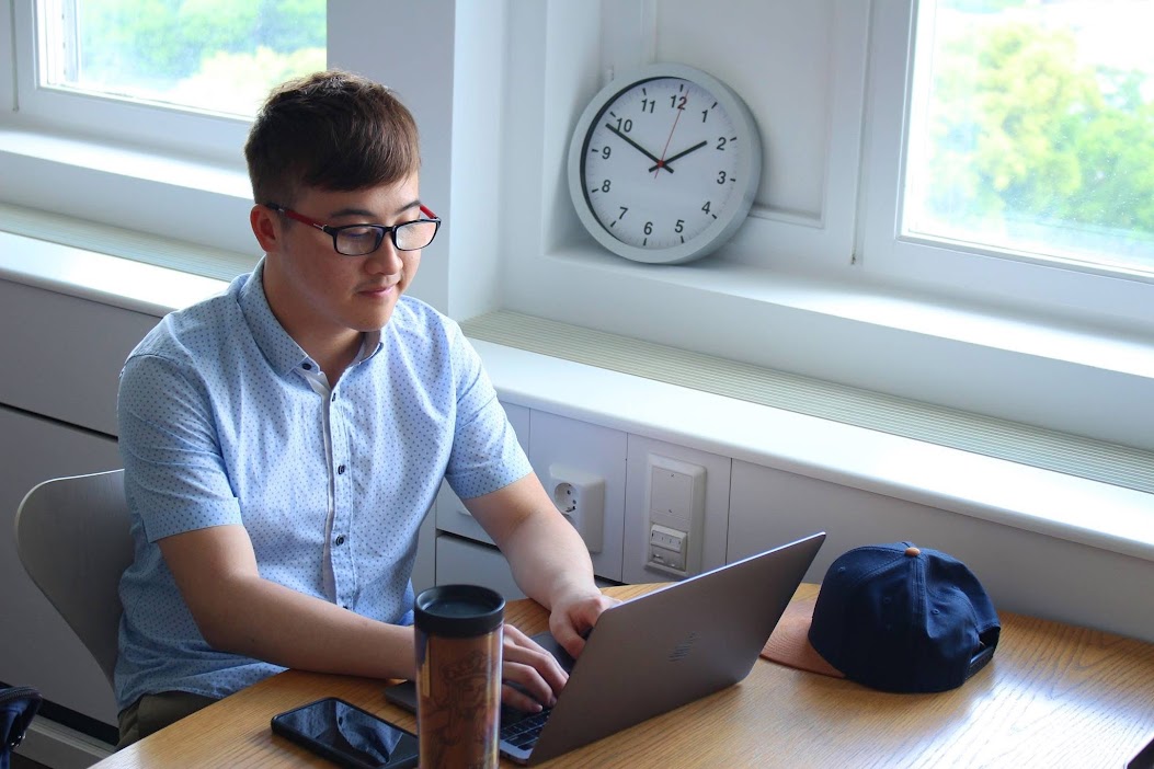 A boy creating his resume for internship