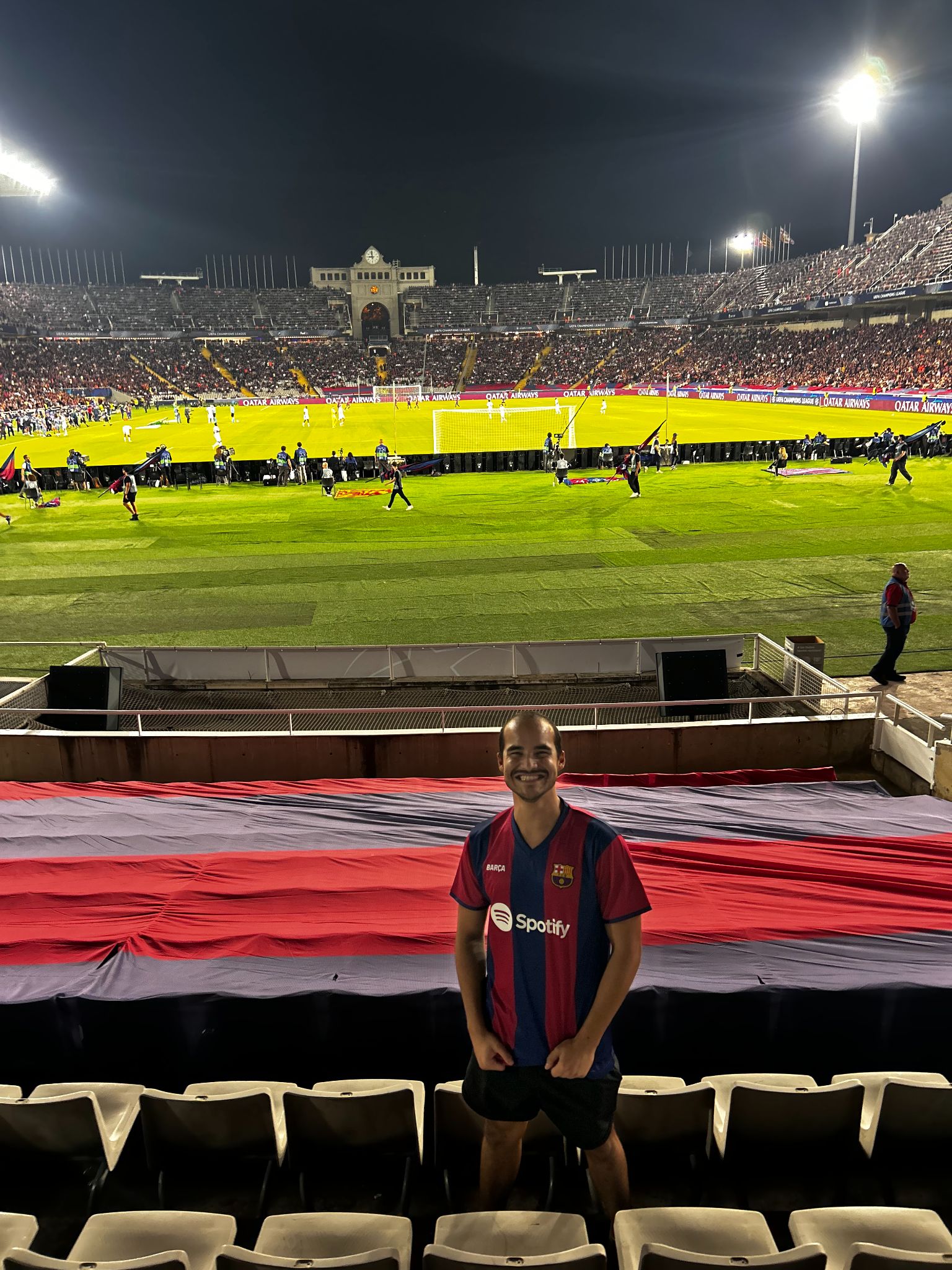 Abraham watching a football game in his internship host city, Barcelona